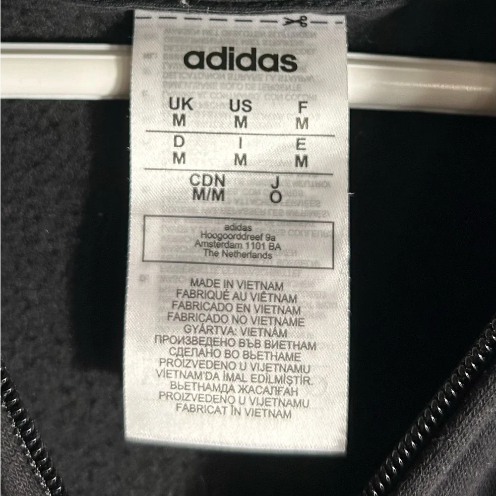 Adidas Black Zip-Up Hoodie with Purple Detail‎